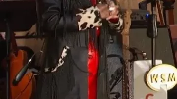 Leather Fringe Coat worn by Lainey Wilson in 100 OPRY: part 3 (Lainey Wilson, Marthy Stuart)