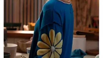 High Potential Season 2 Morgan Gillory Flower Sweater worn by Morgan Gillory (Kaitlin Olson) in High Potential (S02)