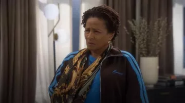 Cernucci Funnel Neck Blue Taping Zip Through Tracksuit worn by Lucretia (Wanda Sykes) as seen in The Upshaws (S07E06)