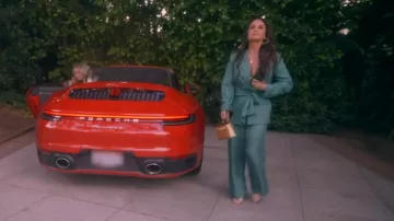 Hermes Metallic Chevre Chamkilight Mini Kelly Sellier 20 Dore worn by Kyle Richards as seen in The Real Housewives of Beverly Hills (S15E06)