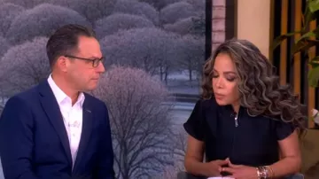 Staud Maelle Ruffled zip-up Top worn by Sunny Hostin as seen in The View on January 27, 2026