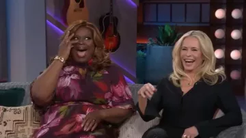 Teri Jon by Rickie Freeman Floral Flutter Sleeve Mock Neck Gown worn by Retta as seen in The Kelly Clarkson Show on January 27, 2026