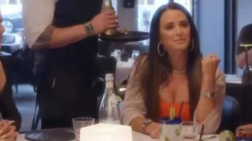 Hermes Bracelet in Barenia Calfskin with an Adjustable Closure worn by Kyle Richards as seen in The Real Housewives of Beverly Hills (S15E07)