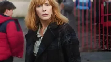 Under Salt Marsh 2026 Kelly Reilly Plaid Coat worn by Jackie Ellis (Kelly Reilly) in Under Salt Marsh