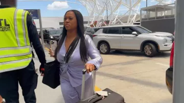 Pinko Woman Top worn by Dr. Heavenly Kimes as seen in Married to Medicine (S12E08)