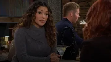 Simkhai Keyara Wool Cashmere Foldover Collar Peplum Sweater worn by Audra Charles (Zuleyka Silver) as seen in The Young and the Restless on January 23, 2026