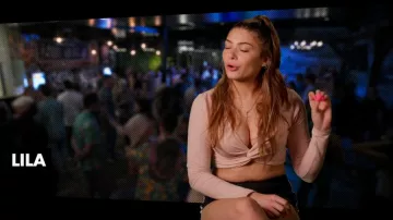 Garage Long Sleeve Twist Front Crop Top Pink worn by Lila Romanin as seen in Canada Shore (S01E02)