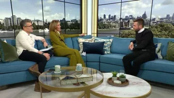 Reiss Priya Twill High-Rise Flared Trousers worn by Cat Deeley as seen in This Morning on January 2026