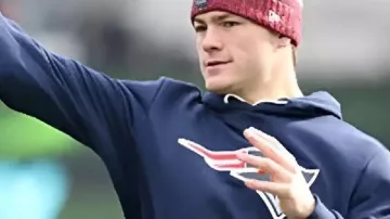 Drake Maye Patriots Sideline Hoodie In Navy in Drake Maye’s Wife Ann Michael Stuns in Custom Patriots Sideline Style