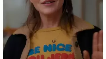 Shrinking S03 Christa Miller Yellow Be Nice You Jerk T-Shirt worn by Liz (Christa Miller) in Shrinking