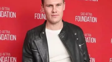 168 (Jackie Kay) dans la signature de Tony Raymond