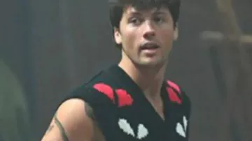 The Traitors US S4 Rob Rausch Broken Heart Black Sweater Vest worn by (Rob Rausch) in The Traitors (S04)