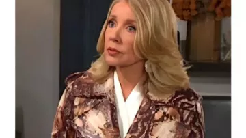 The Young And The Restless S50 Nikki Newman Snake Print Trench Coat worn by Nikki Reed Newman (Melody Thomas Scott) in The Young and the Restless (S52)