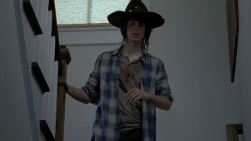 The plaid shirt blue Carl Grimes (Chandler Riggs) in The Walking Dead