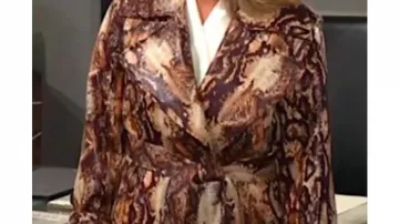 Snake Print Trench Coat worn by Nikki Reed Newman (Melody Thomas Scott) in The Young and the Restless (S52)