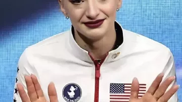 Jeux olympiques de 2026 Amber Glenn Sauver le canard Veste blanche