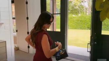 Hermès Kelly 20 Mini Noir/Black Alligator Matte Gold Hardware worn by Kyle Richards as seen in The Real Housewives of Beverly Hills (S15E10)