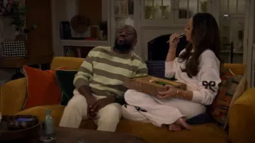 LoveShackFancy Elma Sweatpants worn by Amber Stevens West as seen in The Neighborhood (S08E09)