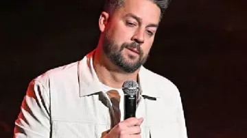 John Crist Jokes for Humans White Jacket in John Crist: Emotional Support (FULL SPECIAL)