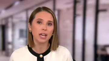 Veste en maille Mango Pia portée par Elizabeth Schulze, vue dans l'émission Good Morning America le 25 février 2026.