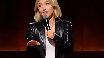 Taylor Tomlinson Prodigal Daughter Coat in the music video Taylor Tomlinson: Prodigal Daughter | Official Trailer | Netflix