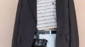 Manteau porté par Caitlin Clark lors de l’arrivée de Caitlin Clark au défilé Prada lors de la Fashion Week de Milan le 26 février 2026