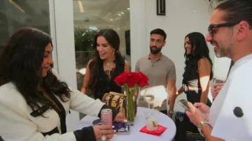 Louis Vuitton Speedy Trunk Monogrammed Handbag worn by Tanin Nikpey as seen in The Valley: Persian Style (S01E08)