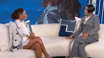 Vestido de tweed a cuadros de Zara que lleva Eva Marcille visto en el desfile de Tamron Hall el 27 de febrero de 2026