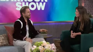 Maniere De Voir Nico Satin-panel Varsity Jacket worn by Derek Hough as seen in The Kelly Clarkson Show on March 17, 2026