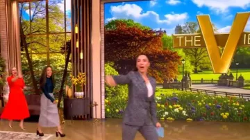 Victoria Beckham Wrap Detail Skirt worn by Sunny Hostin as seen in The View on March 31, 2026