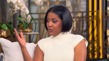 Victoria Beckham Draped Turtleneck Jersey Maxi Dress worn by Tamron Hall as seen in Tamron Hall Show on April 10, 2026