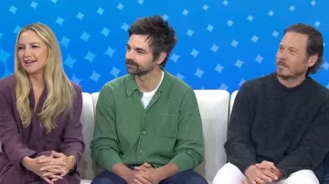 Brain Dead Pigment Dye Long Sleeve Polo Sweater worn by Drew Tarver as seen in Today  on April 21, 2026