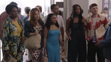 Tommy Bahama Tan Woven Clutch with Wooden Beaded Handle worn by Janine Teagues (Quinta Brunson) as seen in Abbott Elementary (S05E22)