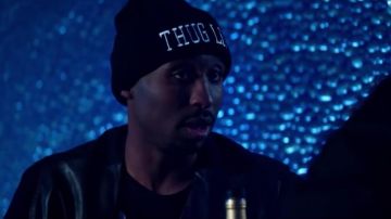 Cap black Thug Life of Tupac Shakur (Demetrius Shipp, Jr.) in All Eyez on Me