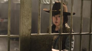 The jacket beige, without the handle, Carl Grimes (Chandler Riggs) in The Walking Dead S03E02