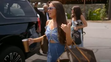 Louis Vuitton Monogram Keepall Bandouliere 55 worn by Kelsey Swanson as seen in The Real Housewives of Rhode Island (S01E06)