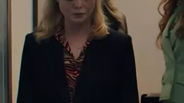 Margos tiene problemas económicos Blazer vaquero Elle Fanning 2026