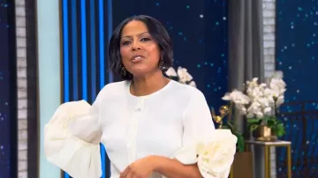 Carolina Herrera Silk Floral Sleeve Blouse worn by Tamron Hall as seen in Tamron Hall Show on May 1, 2026