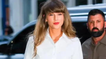 This White Peplum Shirt worn by Taylor Swift in Taylor Swift Continues Her Bridal White Streak in Peplum Top as Her Wedding to Travis Kelce Approach