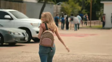 Coach Court Backpack In Maxi Signature Canvas worn by Cassie (Jessica Belkin) as seen in Dutton Ranch (S01E01)