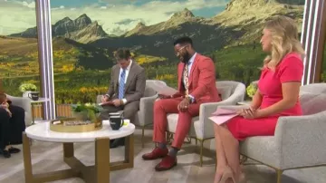 Donna Karan Short Sleeve Split V-neck Sheath Dress worn by Kelly O'Grady as seen in CBS Mornings on May 11, 2026