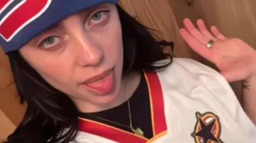Billie Eilish Camo Blohsh Basketball Jersey of Billie Eilish in Unboxing the official Billie eilish gold blohsh necklace and CAMO BLOHSH BASKETBALL JERSEY