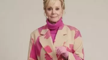 Jean Smart Hacks S05 Floral Print Trench Coat worn by Deborah Vance (Jean Smart) as seen in Hacks (S05)