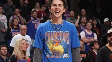 Timothee Chalamet Knicks-Cavs Game 4 Blue Shirt in Timothée and Kylie hype after Knicks swept Cavs ???? (via AshNoelleTV/X)