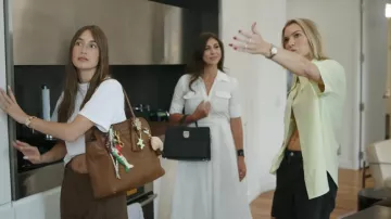 Miu Miu Brown Adventure Leather Bag worn by Amanda Batula as seen in In the City (S01E02)