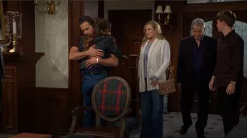 Banana Republic Italian Suede Accordion Bag worn by  Sharon Newman(Sharon Case) as seen in The Young and the Restless on May 28, 2026