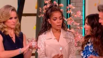 L'Agence Novelle Cropped Lace-Sleeve Trench Coat worn by Sunny Hostin as seen in The View on  June 15, 2026