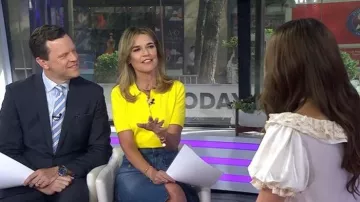 Aknvas Emma Short-Sleeve Polo Top worn by Savannah Guthrie as seen in Today on June 25, 2026