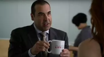The mug with "You Just Got Litt Up!" from Louis Litt (Rick Hoffman) in Suits
