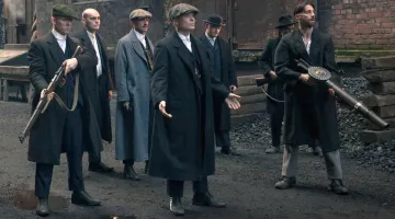 Le manteau en laine gris clair de Arthur Shelby (Paul Anderson) dans Peaky Blinders S01E06